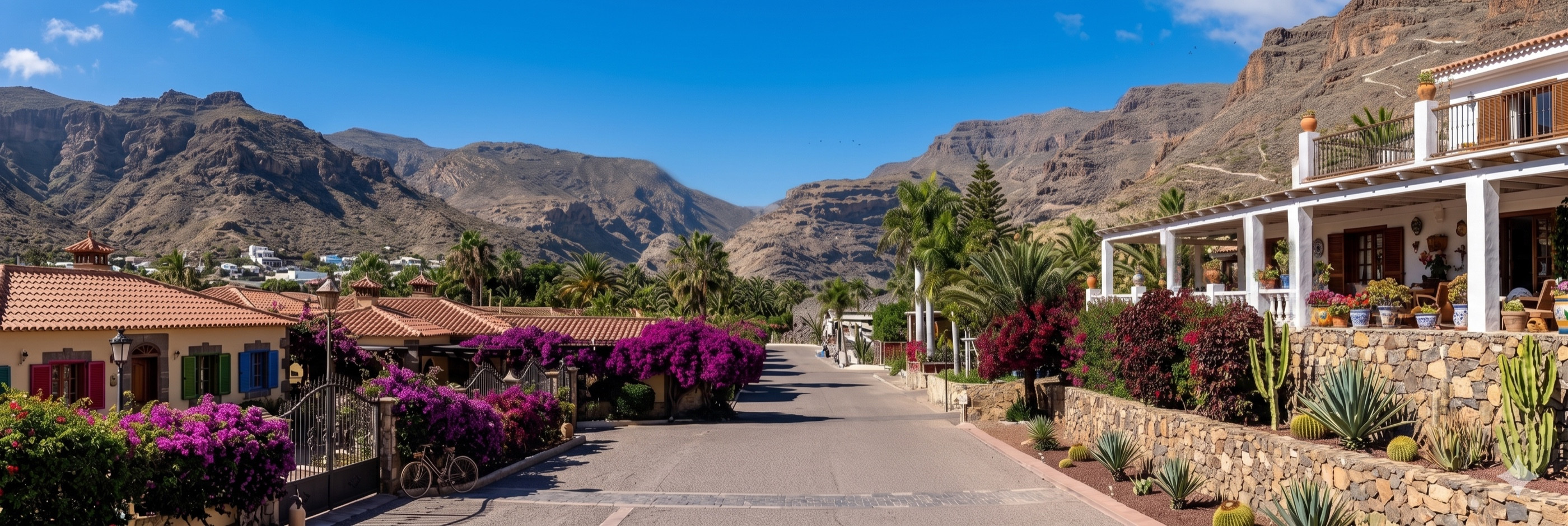 Bougainvillea-lined street with mountain views at Loma del Mar